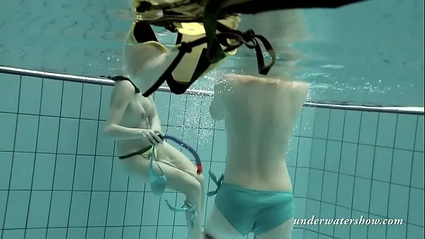 Watch Girls swimming underwater and enjoying eachother power Tube